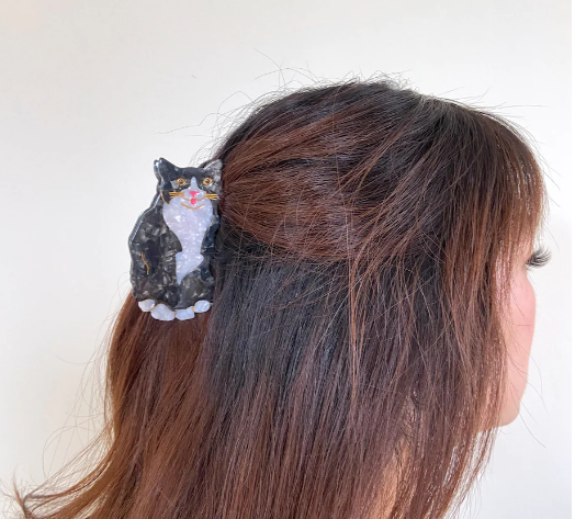 woman wearing cat hair clip